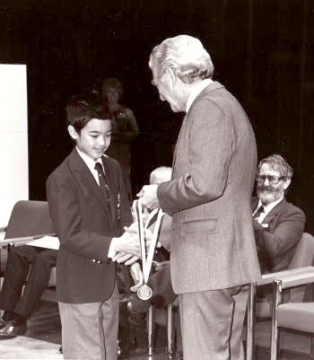 Terence Tao receiving his IMO gold medal from Prime Minister Bob Hawke at IMO 1988